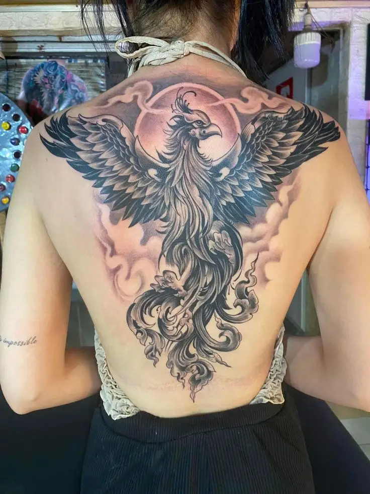 Hình xăm phượng hoàng full lưng: Biểu tượng của sự hồi sinh và mạnh mẽ 32