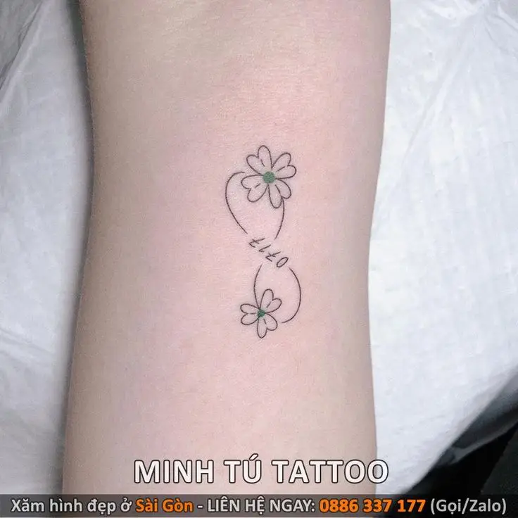 Hình xăm ở bắp tay nữ mini - Sự tinh tế trong từng chi tiết 34