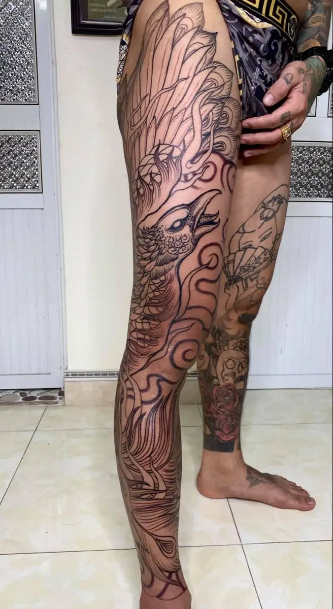 Ngắm nhìn hình xăm phượng hoàng full chân ấn tượng 50